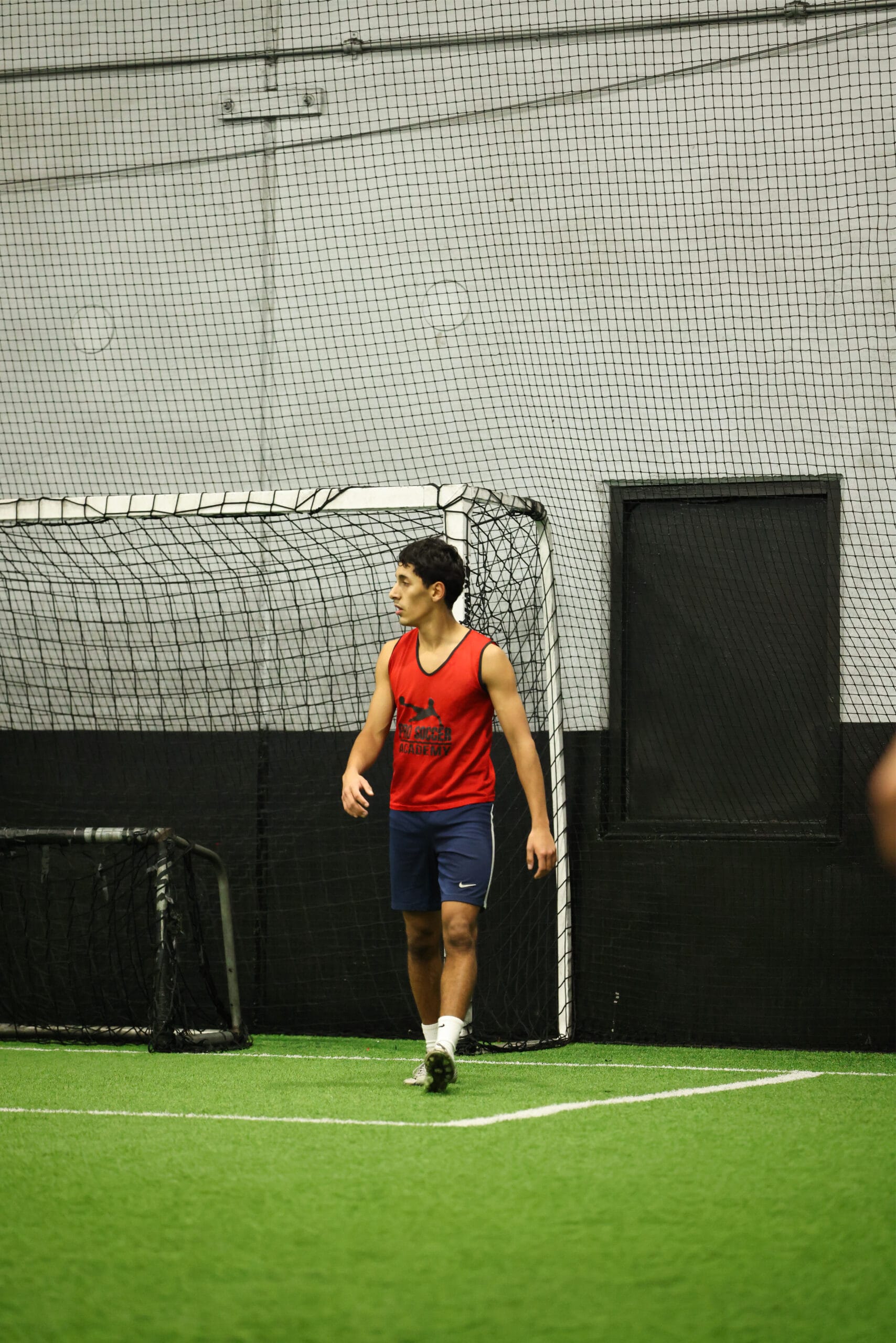5K2A0660 Soccer player walking off the field during an indoor soccer training session in New Jersey