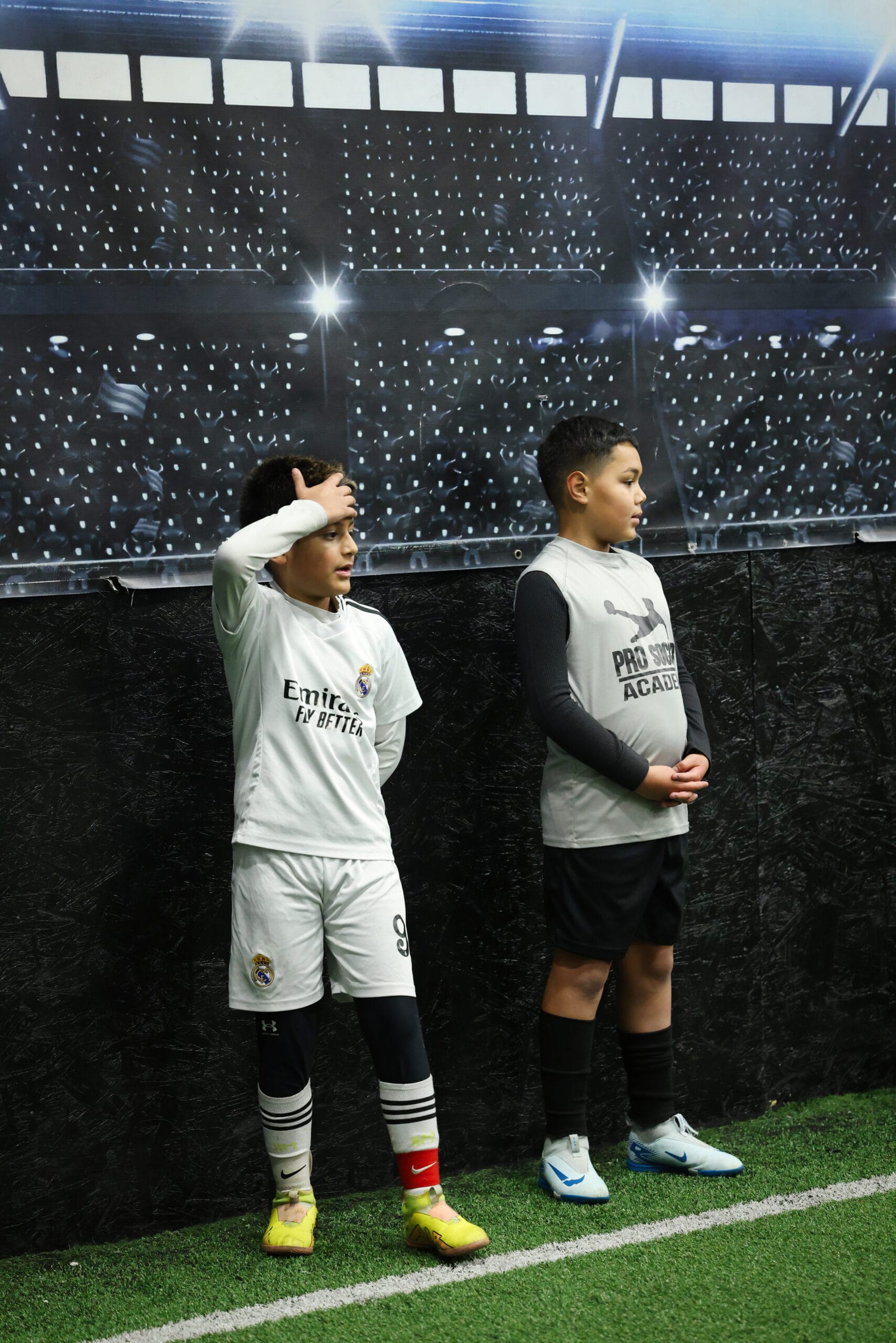 5K2A8705 Children participating in an organized indoor soccer training environment