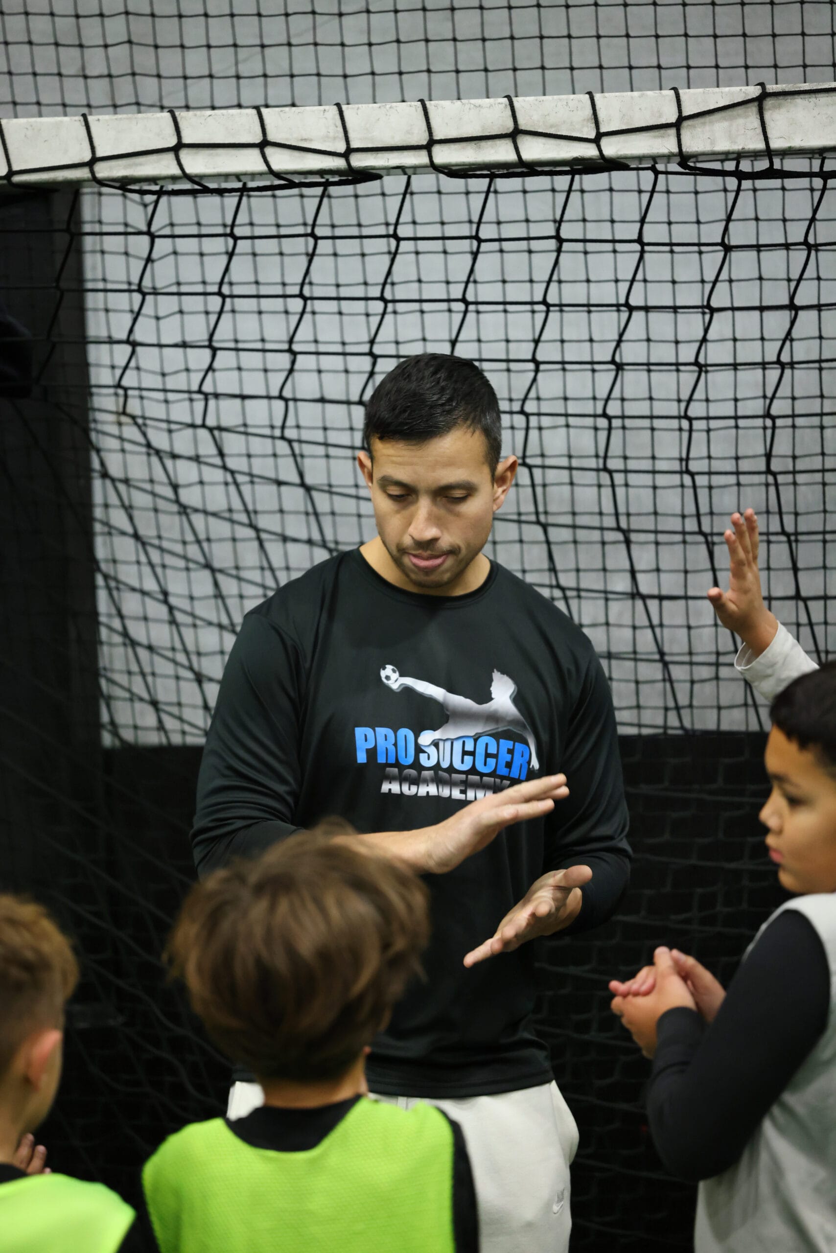 5K2A8710 Kids receiving coaching during an indoor soccer training session in New Jersey