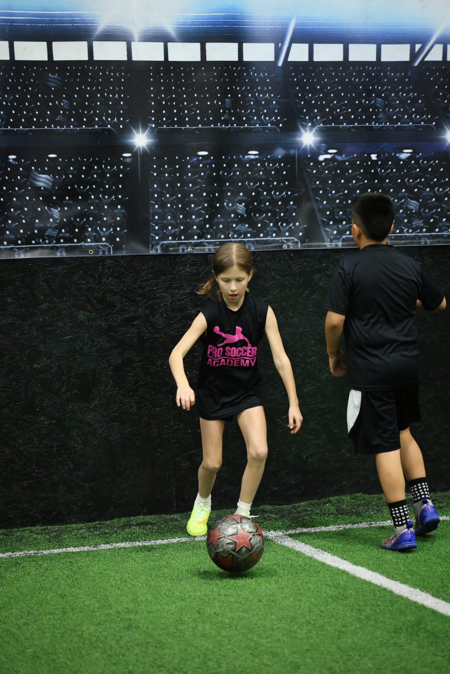 5K2A8775 Youth soccer player controlling the ball during indoor soccer training at a New Jersey soccer facility