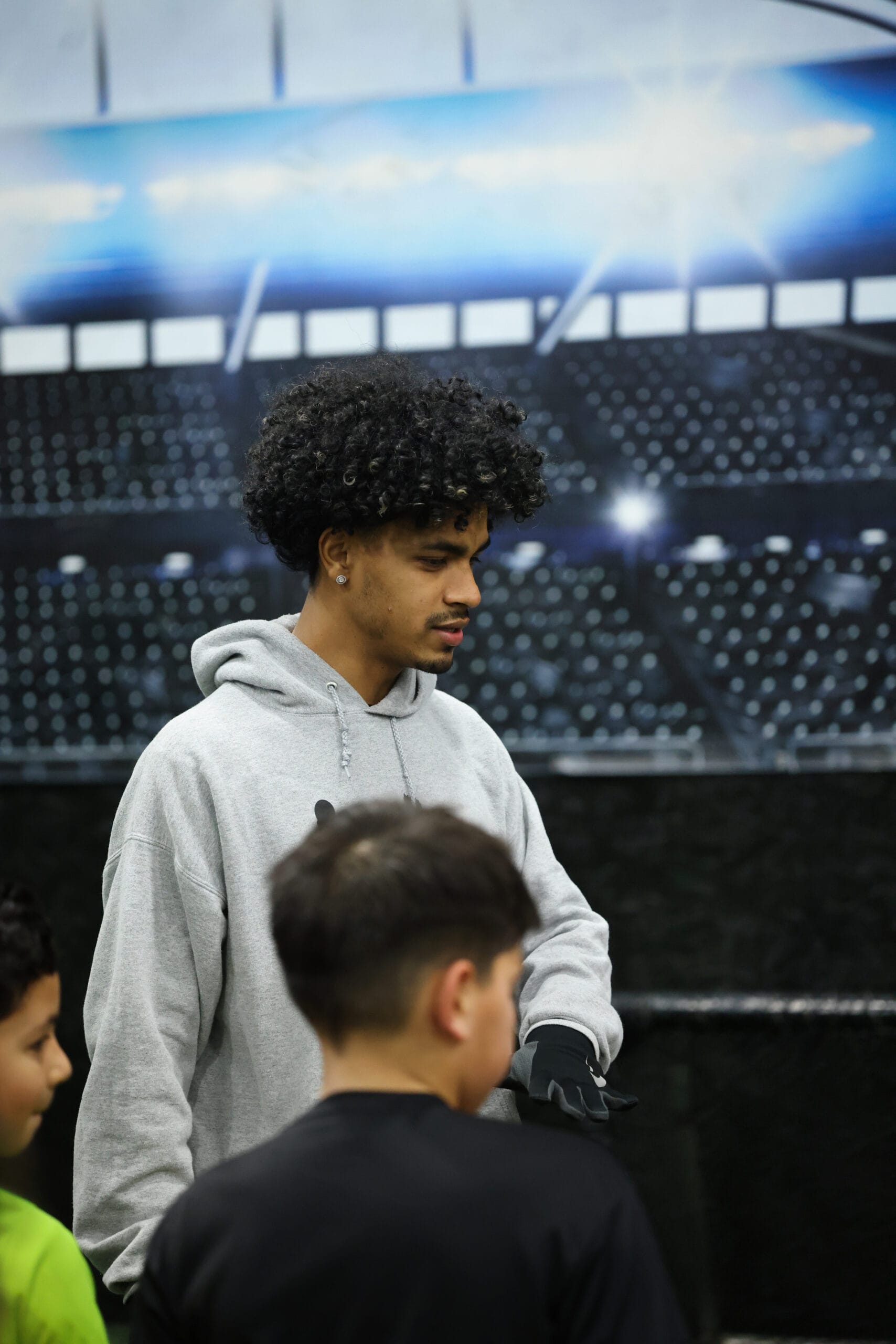 5K2A8788 Soccer coach instructing young players during an indoor youth soccer training session in New Jersey