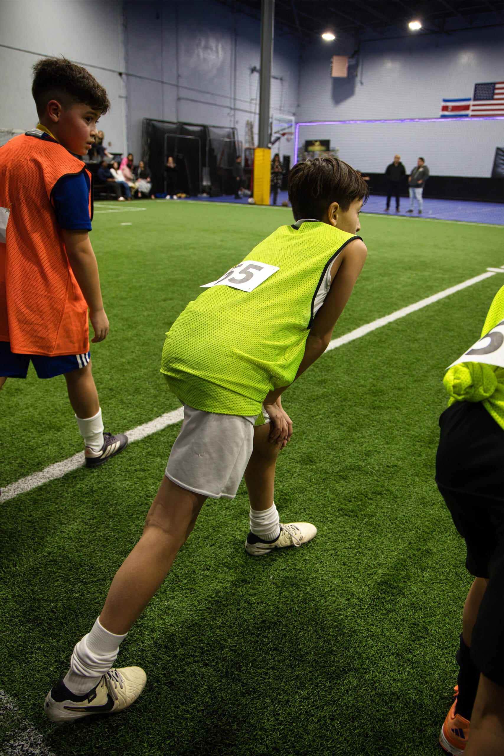 4Q8A0119 Youth soccer players receiving instructions from coach at Pro Soccer Academy