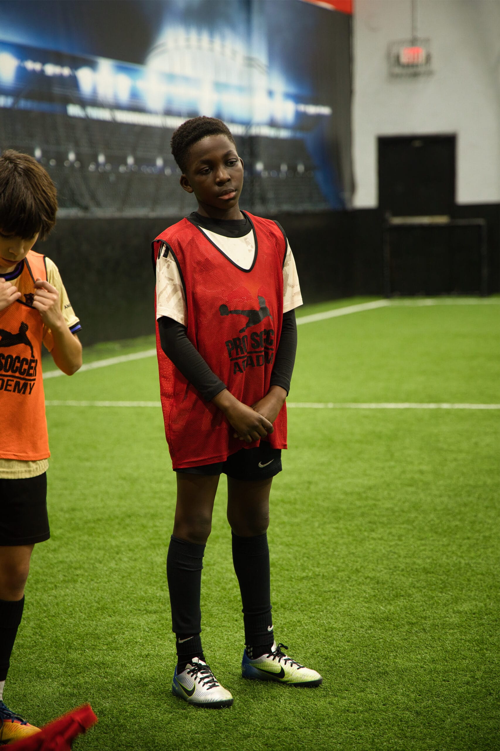 4Q8A0140 Focused youth soccer player at Pro Soccer Academy indoor training session
