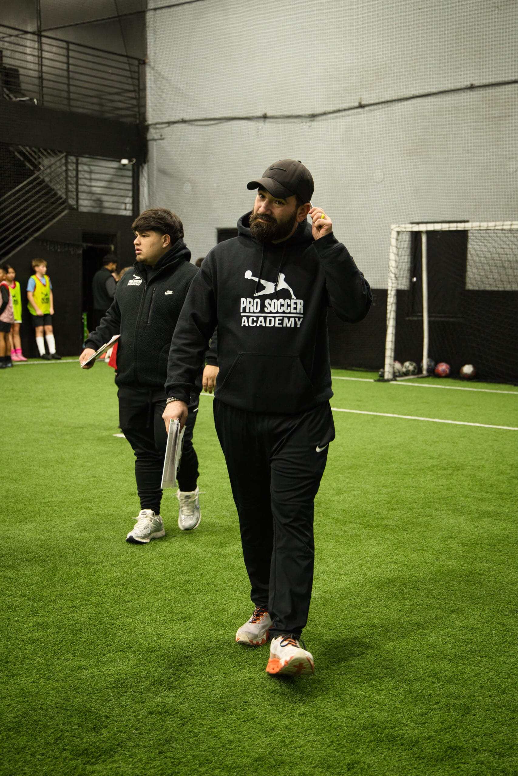 4Q8A0148 Pro Soccer Academy coach evaluating players during youth soccer tryouts